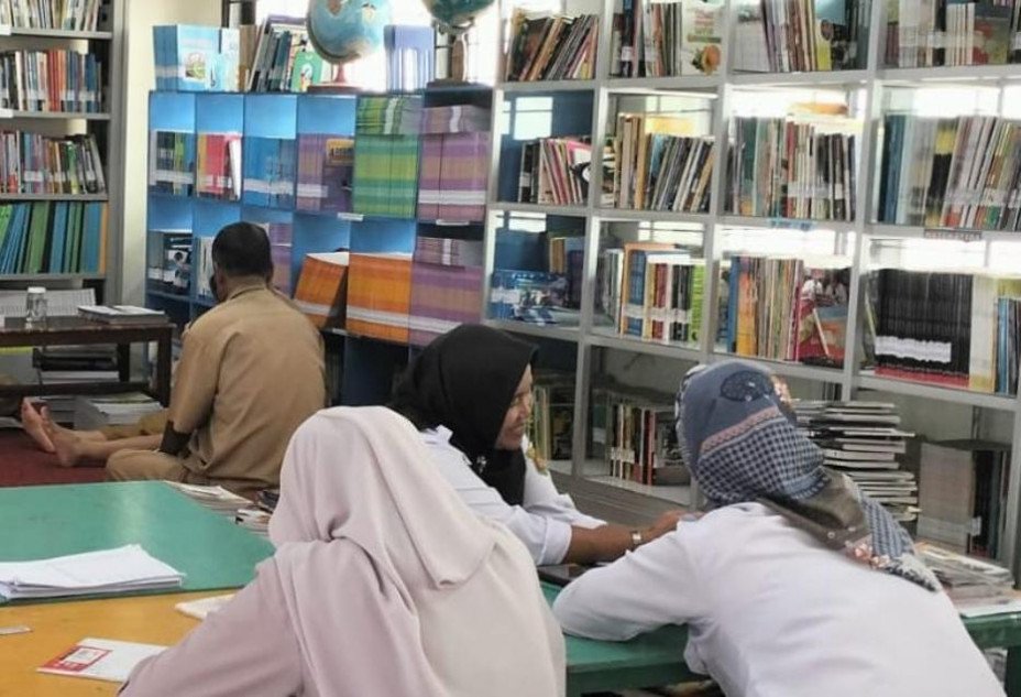 Inslite Permudah Pustakawan SMPN 22 Samarinda Kelola Perpustakaan
